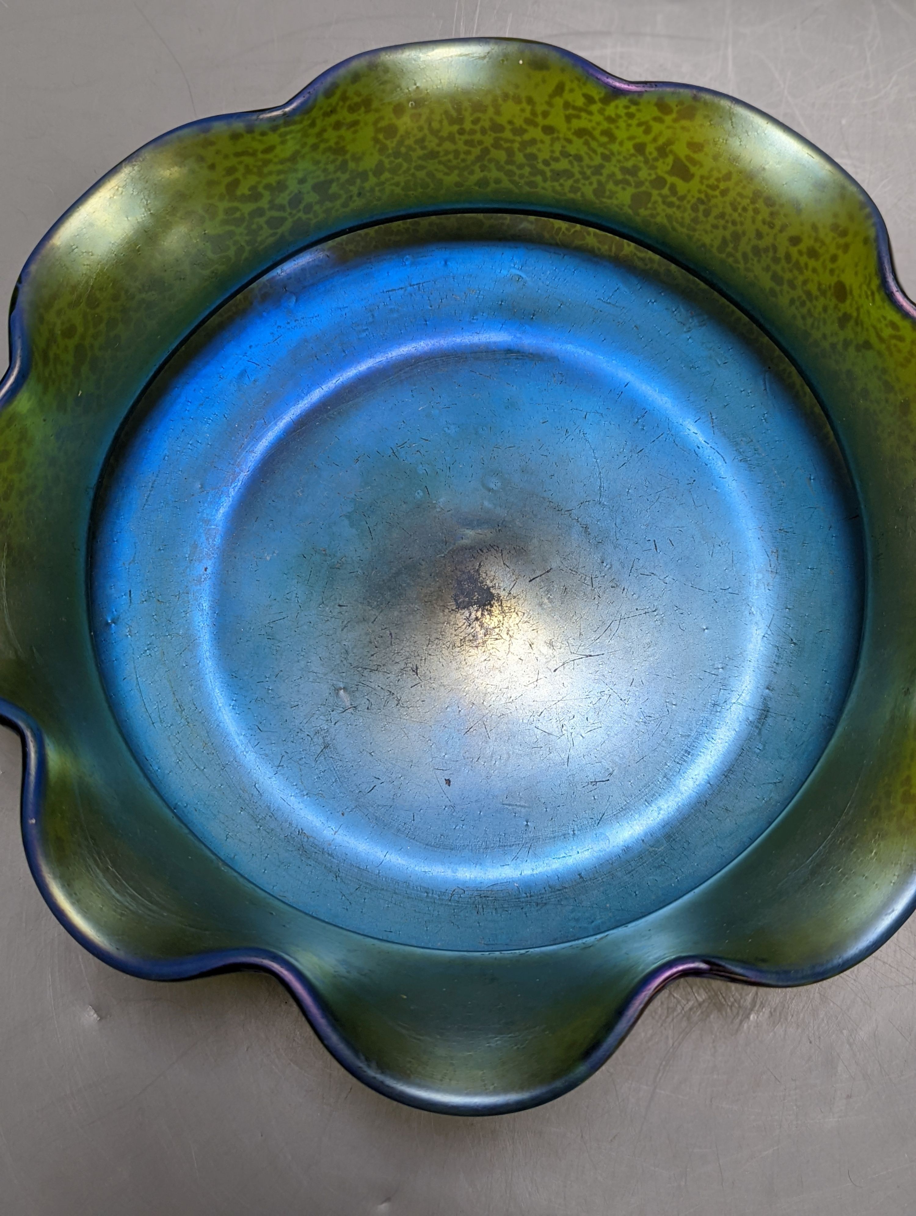 An Austrian iridescent glass bowl, probably Loetz, c.1910, diam. 26.5cm